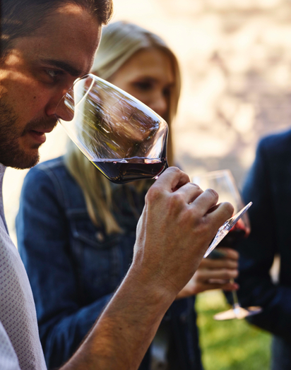 Person tasting wines